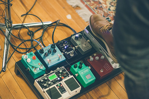 Guitar pedal board with multiple pedals