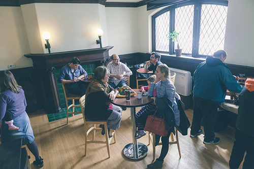Group of church goers sitting around a table